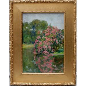 Louis Valtat (Français 1869-1952), attribué à Paysage avec buisson fleuri au bord du lac