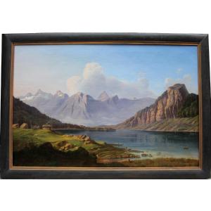 Peinture monumentale représentant un lac de montagne par Josef Hölzl (autrichien, 1809 - 1891)