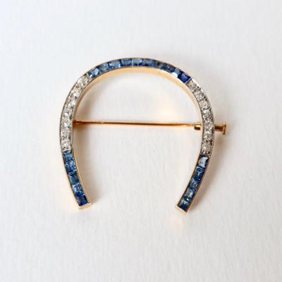 Horseshoe Brooch Around 1920 In 18-carat Yellow Gold Sapphires And Diamonds