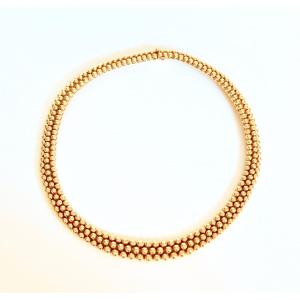 Boucheron Necklace In 18 Carat Yellow Gold Forming A Ribbon Of 3 Rows Of Gold Balls.