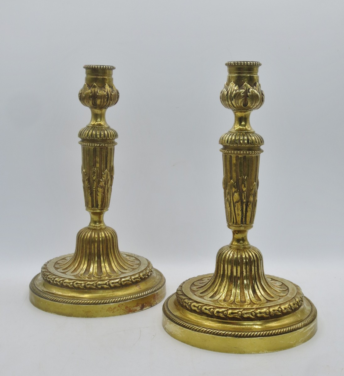 Paire de flambeaux de style Louis XVI. 