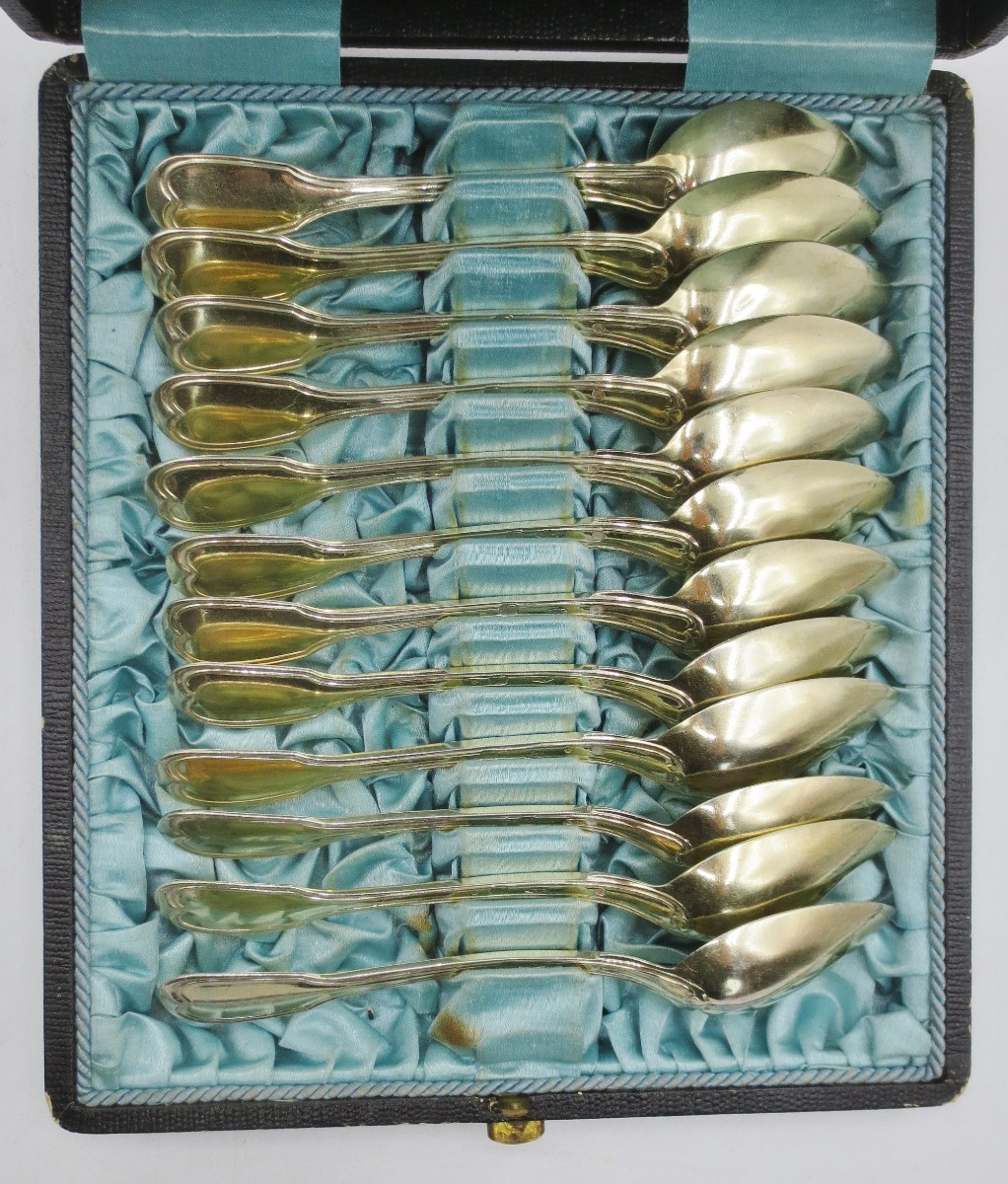 Suite Of Twelve Small Spoons In Vermeil.  