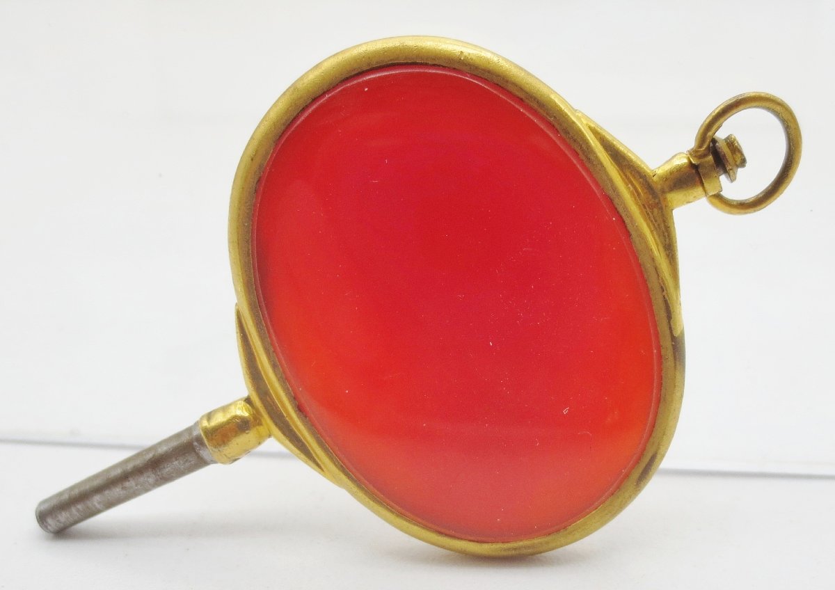 Watch Key, Orange Agate, And Pompon, Early 19th Century.