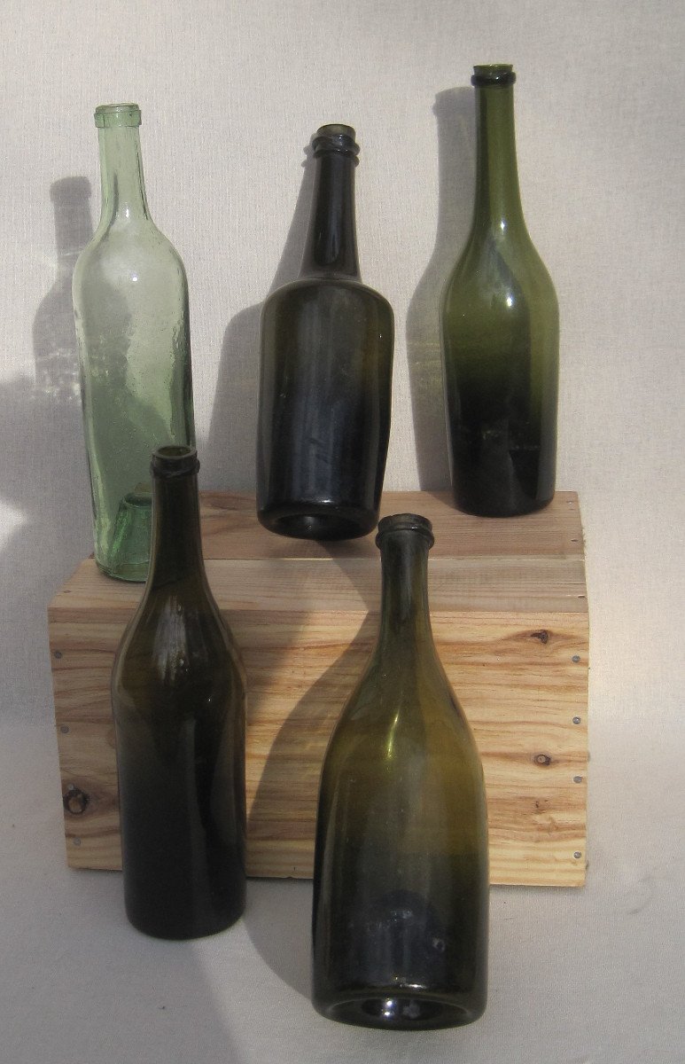 Meeting Of 5 Wine Bottles, In Blown Glass. 18th Century.
