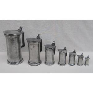 Complete Set Of 7 Covered Measurements Of The Metric System, In Pewter. 19th Century.