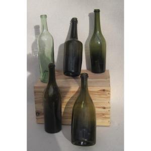 Meeting Of 5 Wine Bottles, In Blown Glass. 18th Century.
