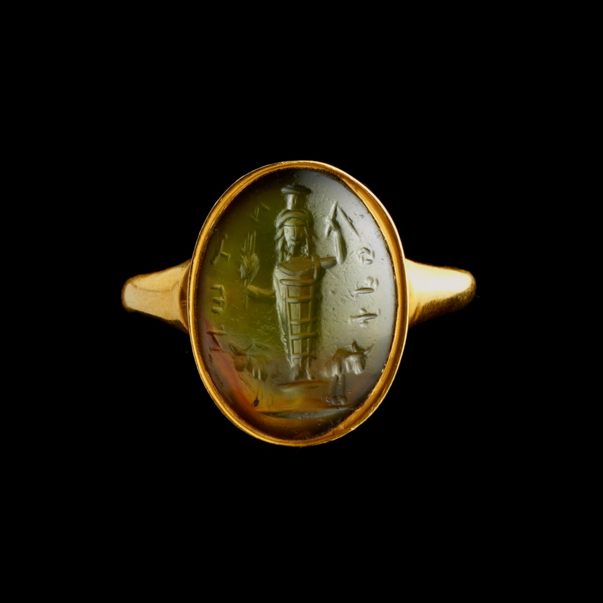 Bague chevalière en or sertie d'une intaille magique romaine en prasium — Jupiter Héliopolitain