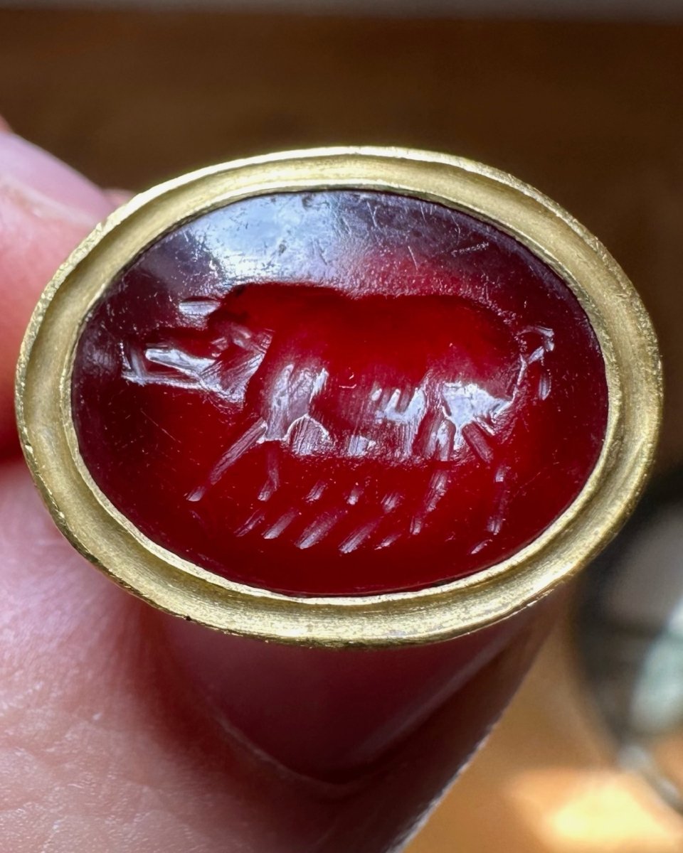 A Modern Gold Ring Set With A Roman Carnelian Intaglio. Sow.