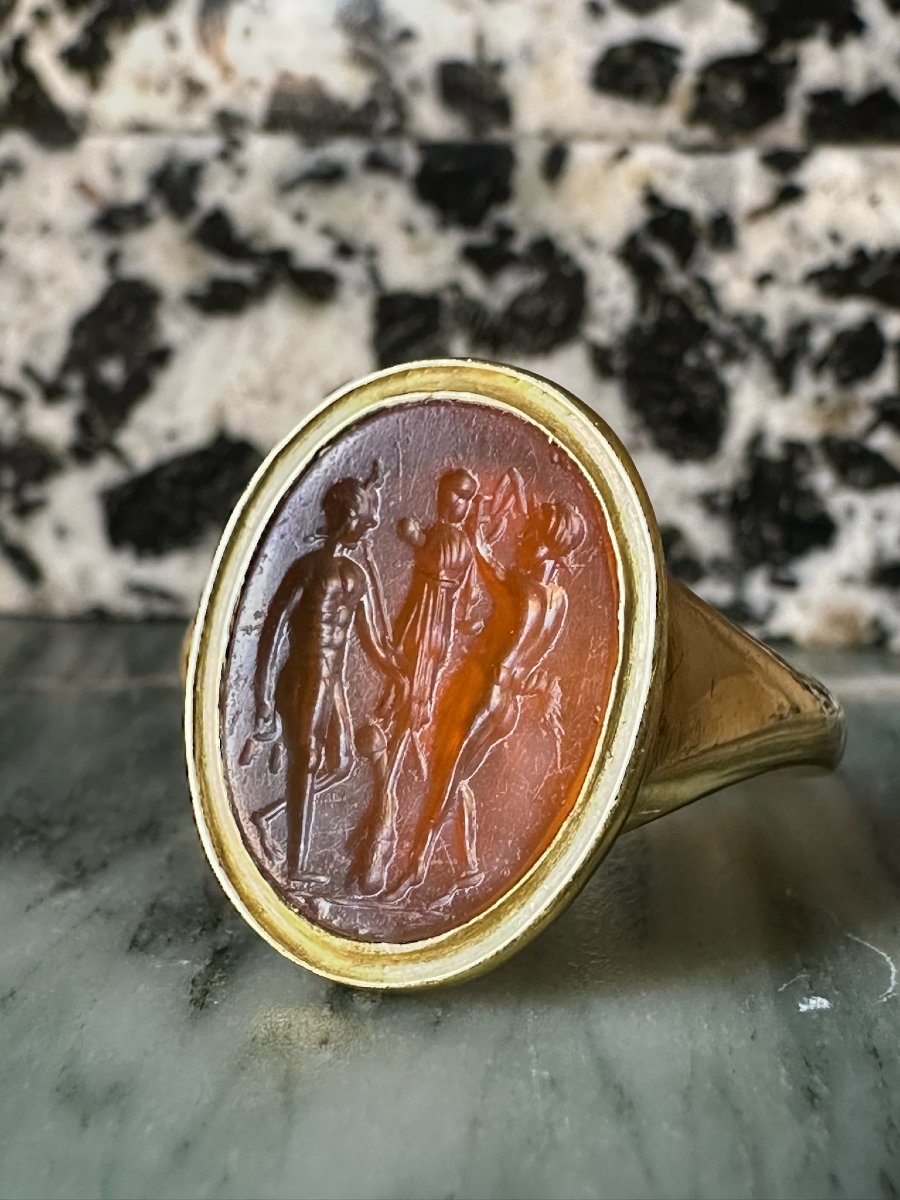 A Gold Ring Set With A Roman Carnelian Intaglio. Two Satyrs Crowning A Trophy.-photo-3