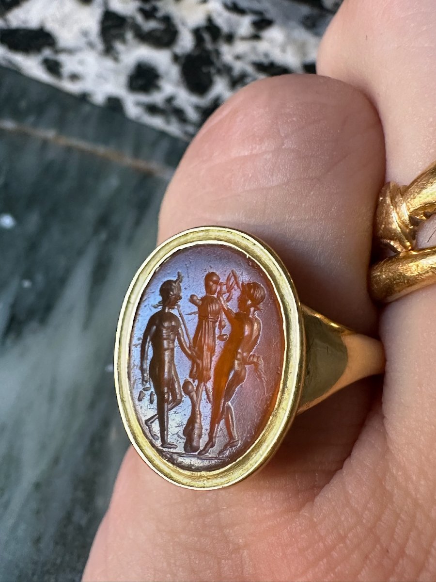 A Gold Ring Set With A Roman Carnelian Intaglio. Two Satyrs Crowning A Trophy.-photo-2