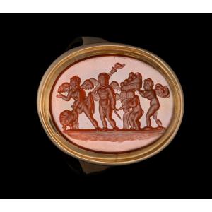 A Late 18th Century Gold Ring Set With A Carnelian Intaglio. The Mariage Of Love And Psyche.
