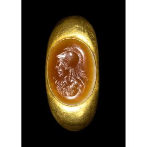 A Large Roman Hollow Gold Ring Set With An Agate Intaglio. Bust Of Athena.