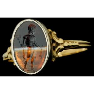A Victorian Gold Ring Set With A Roman Banded Agate Intaglio. Mercury.