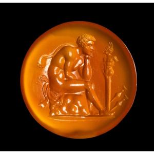 Grand Tour Intaglio On Carnelian Of A Young Faun Seated Before An Ithyphallic Hermes Of Pan