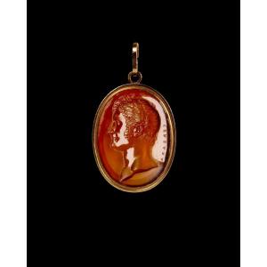 A Gold Pendant Set With A Glass Impression. Portrait Of Felice Baciocchi Engraved By Cerbara