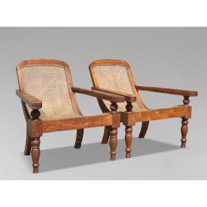 Pair Of Large Early 20th Century Teak & Cane Colonial Plantation Chairs