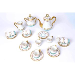 Service à café en porcelaine de Limoges – Augé-Munsch Narbonne – décor fleuri et or – 11 pers