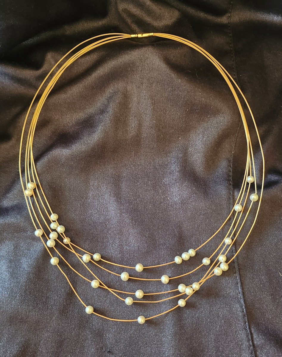 Pearl And Gold Strand Necklace