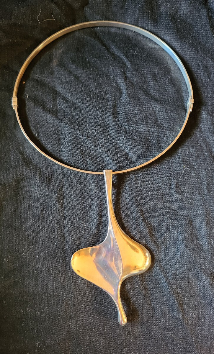 Collier torque et figure libre David Andersen