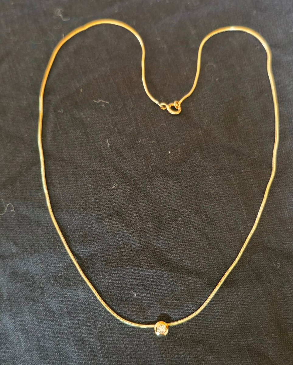 Gold Necklace Set With A Solitaire