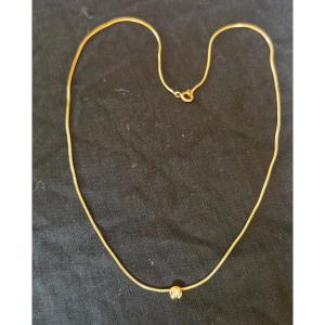 Collier en or sertie d'un solitaire