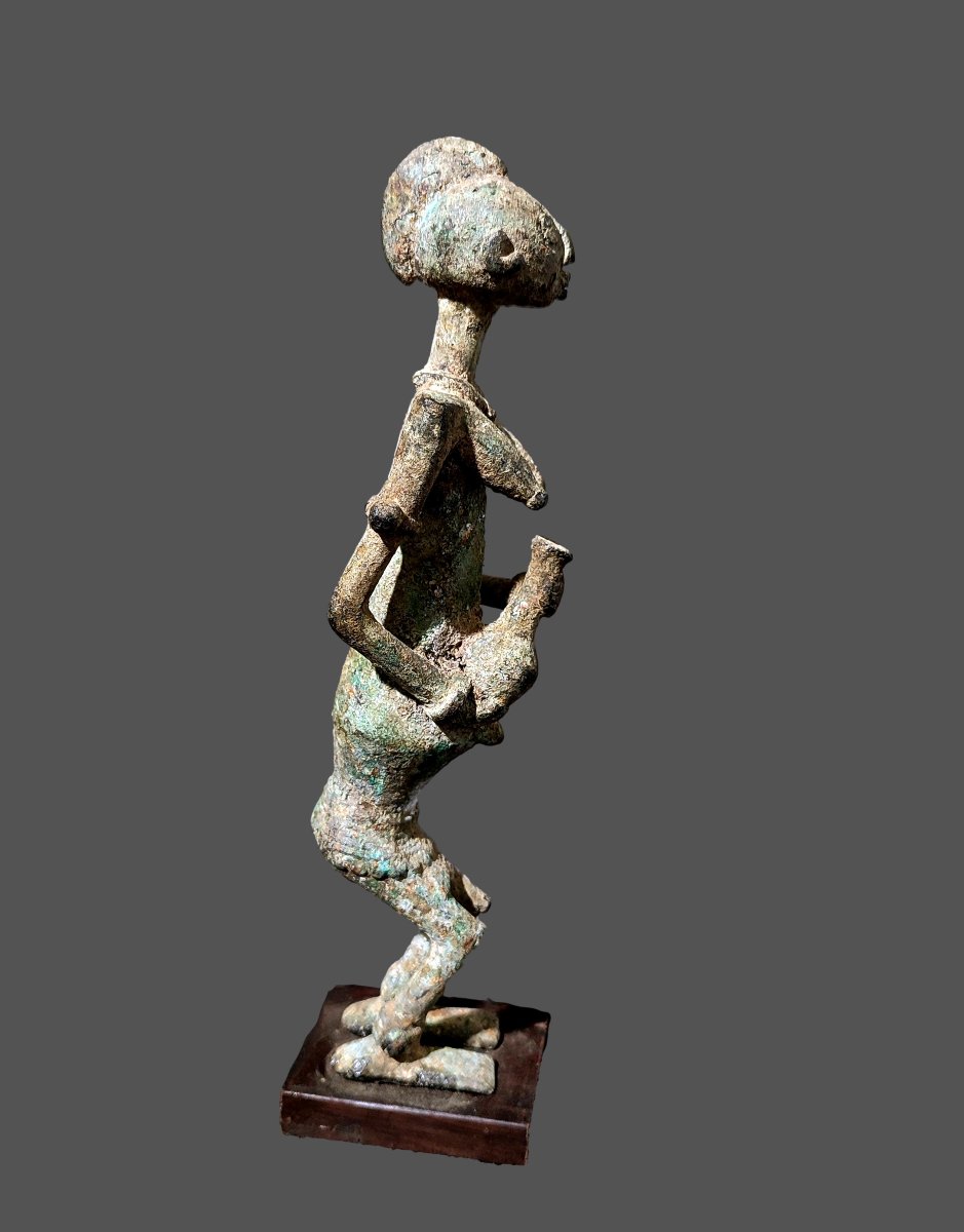 Woman With A Bronze Amphora From A Dogon Excavation Site In Mali 
