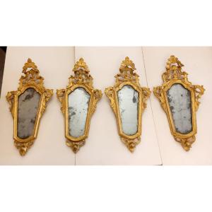 Lot de quatre miroirs vénitiens