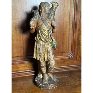 Statuette en terre cuite polychrome à dorure à l'or pur représentant le « Bon Pasteur »