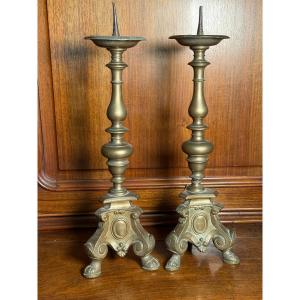 Paire de chandeliers en bronze tourné, XIXe siècle  