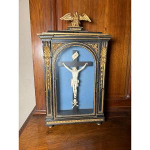 A Wooden Display Case Painted Ebony Black With Carvings In Pure Gold Depicting Christ In Ivory