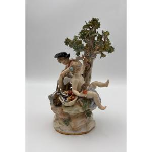 Polychrome Porcelain Group With Cherubs And Tree