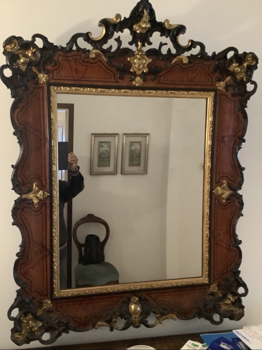 Miroir en bois a’ motifs d’ore’s  et noircis Italie debut du XIXe siecle