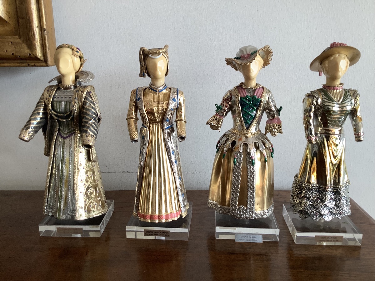 Four Silver And Gold Sculptures Depicting The History Of Ancient Fashion, 20th Century, Italy
