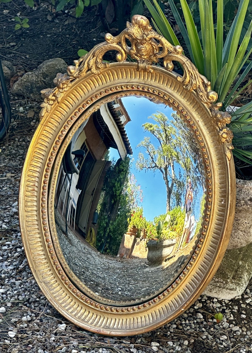 Miroir « Sorcière » en bois doré, XIXe siècle