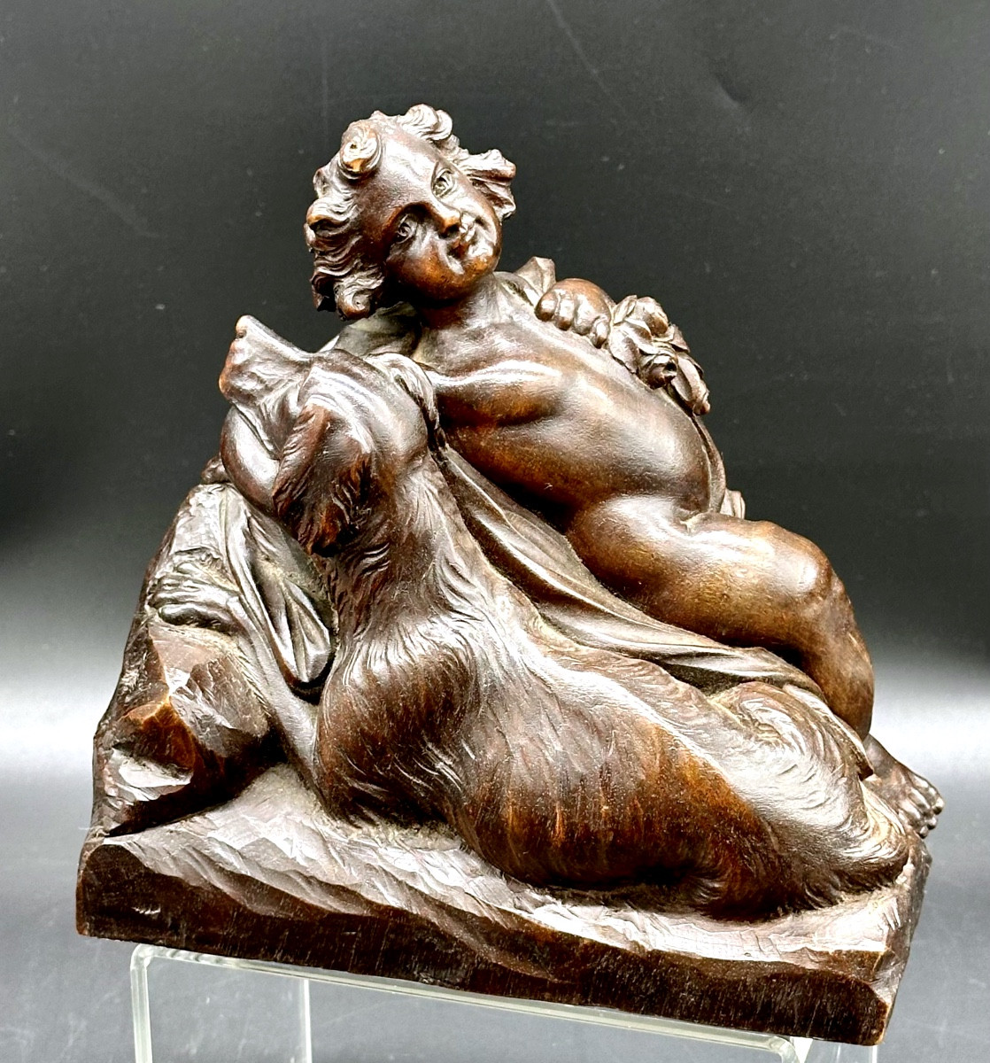 Carved Wood Sculpture - Cherub With Dog Period: 19th Century
