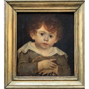 Portrait d’enfant au raisin sur panneau, école française vers 1820, cercle de Dubois-Drahonet 