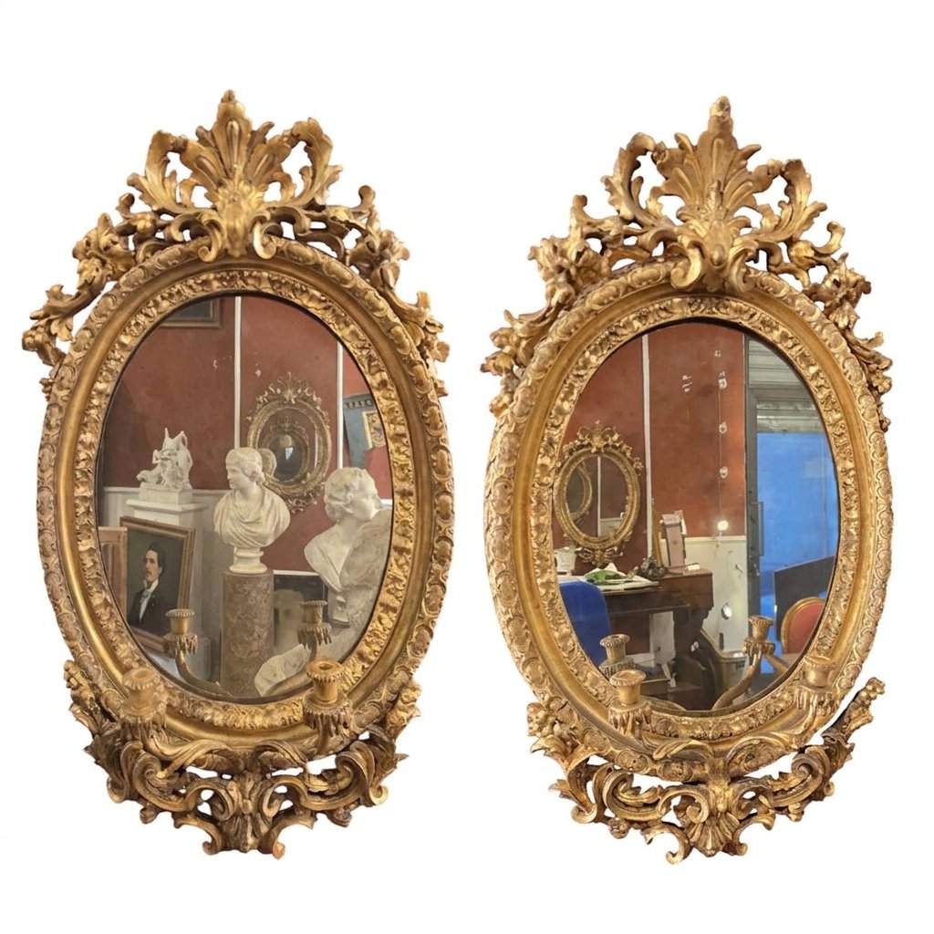 Paire de miroirs ovales