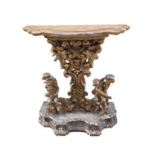 Console en bois sculpté et doré