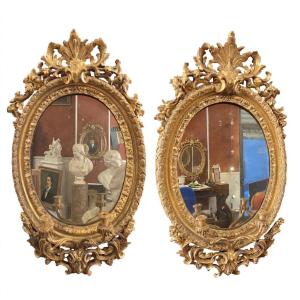 Paire de miroirs ovales
