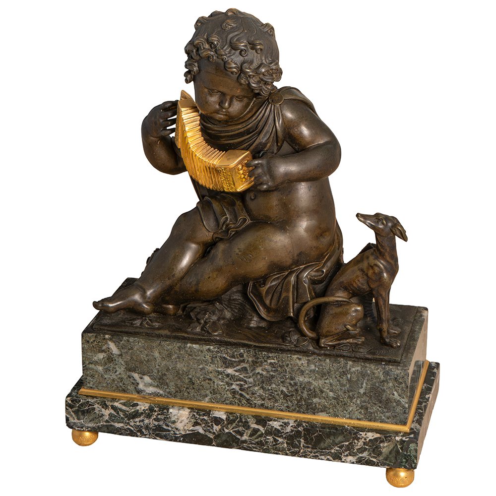 Sculpture représentant un putto musicien-photo-1