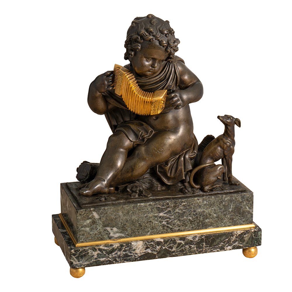 Sculpture représentant un putto musicien