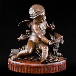 Sculpture Représentant Cupidon Jouant Avec Un Pigeon – Victor Paillard