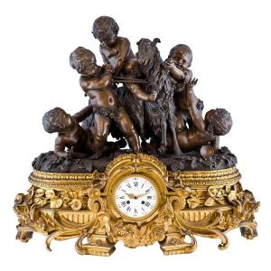 French Clock Depicting Cherubs Playing With A Goat