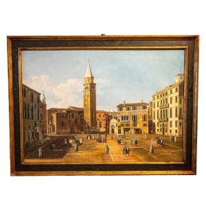 Painting Depicting A Venetian View With A Square And A Bell Tower