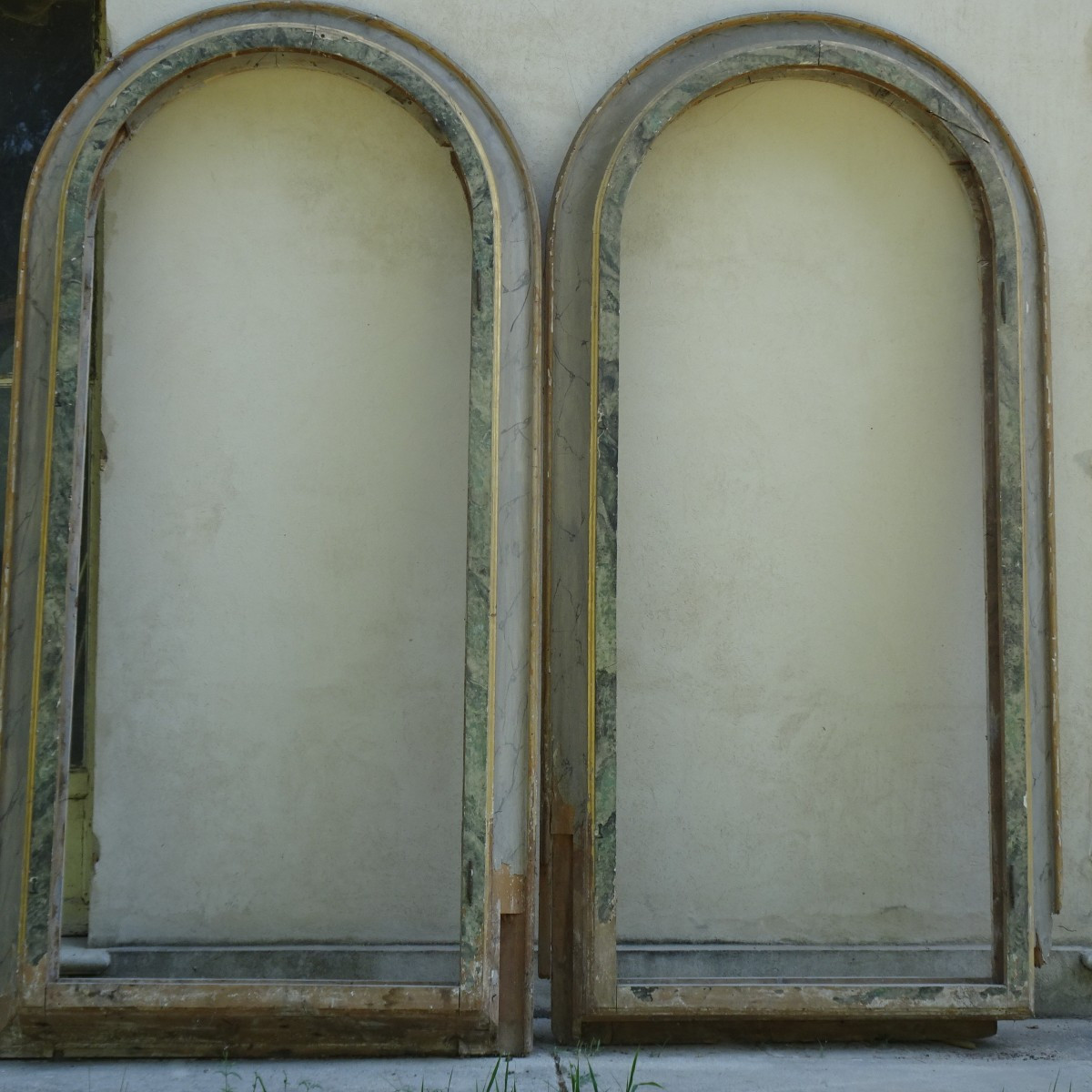 Pair of large lacquered wall frames for 18th century niches