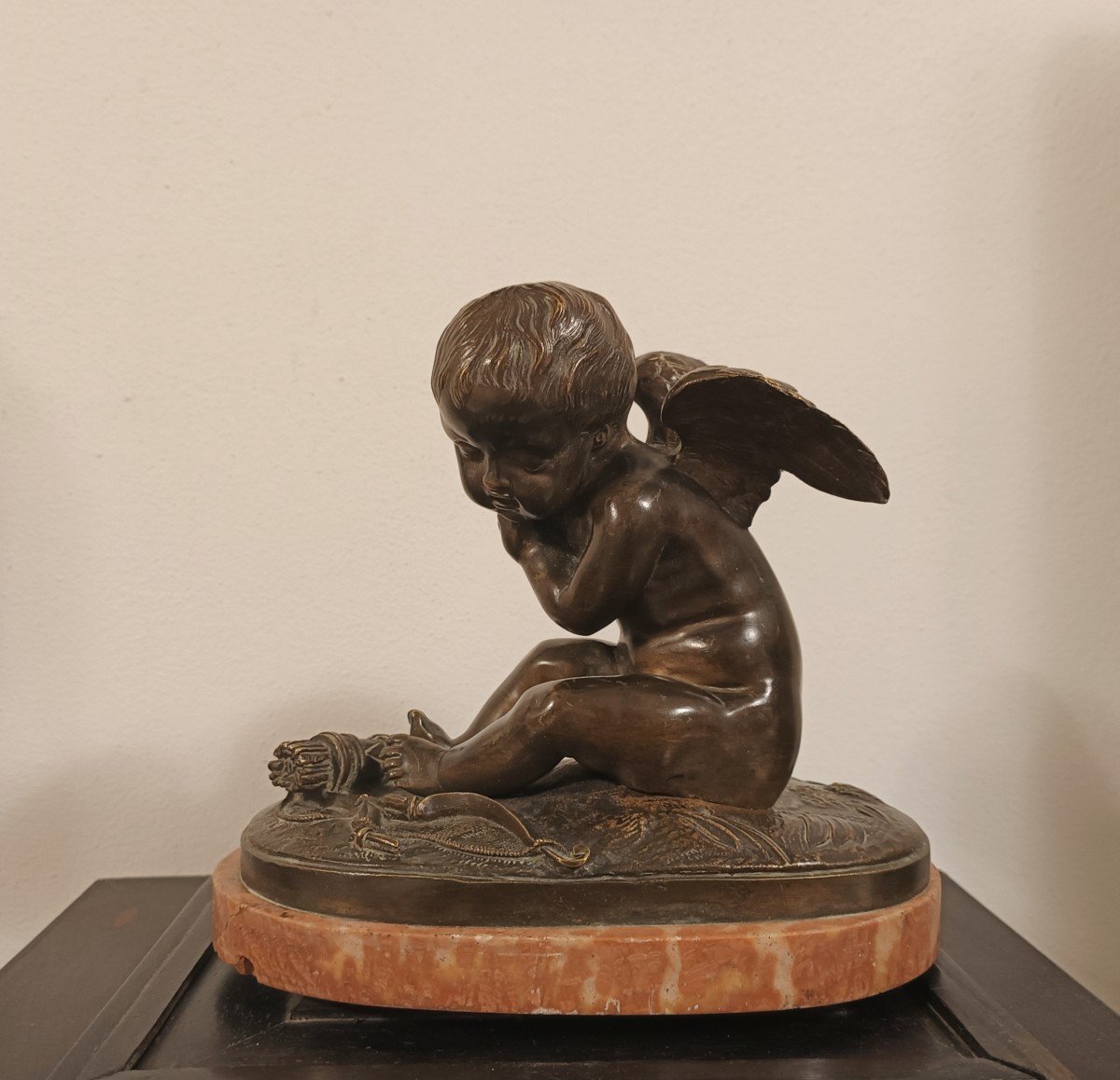 Bronze Sculpture Depicting Cupid, On Its Original Red Marble Base.france,mid 19th Century.