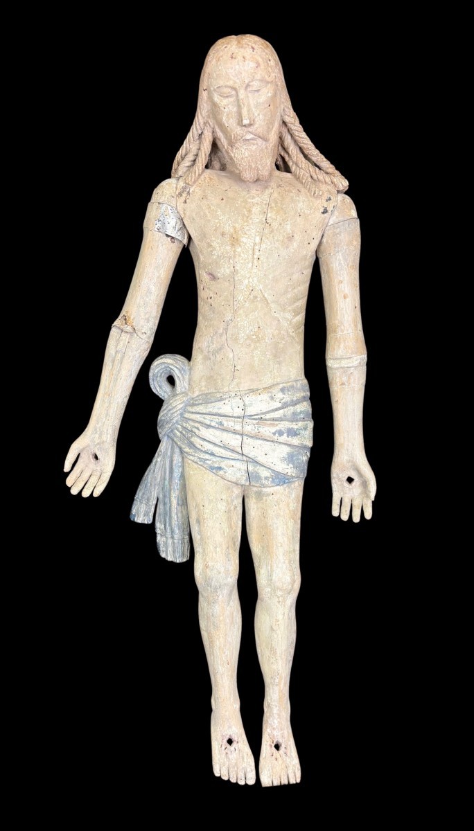 Sculpture représentant le Christ en bois laqué, avec bras articulés