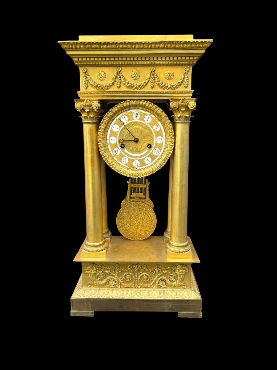 Gilt-bronze Portico Clock From The Empire Period.