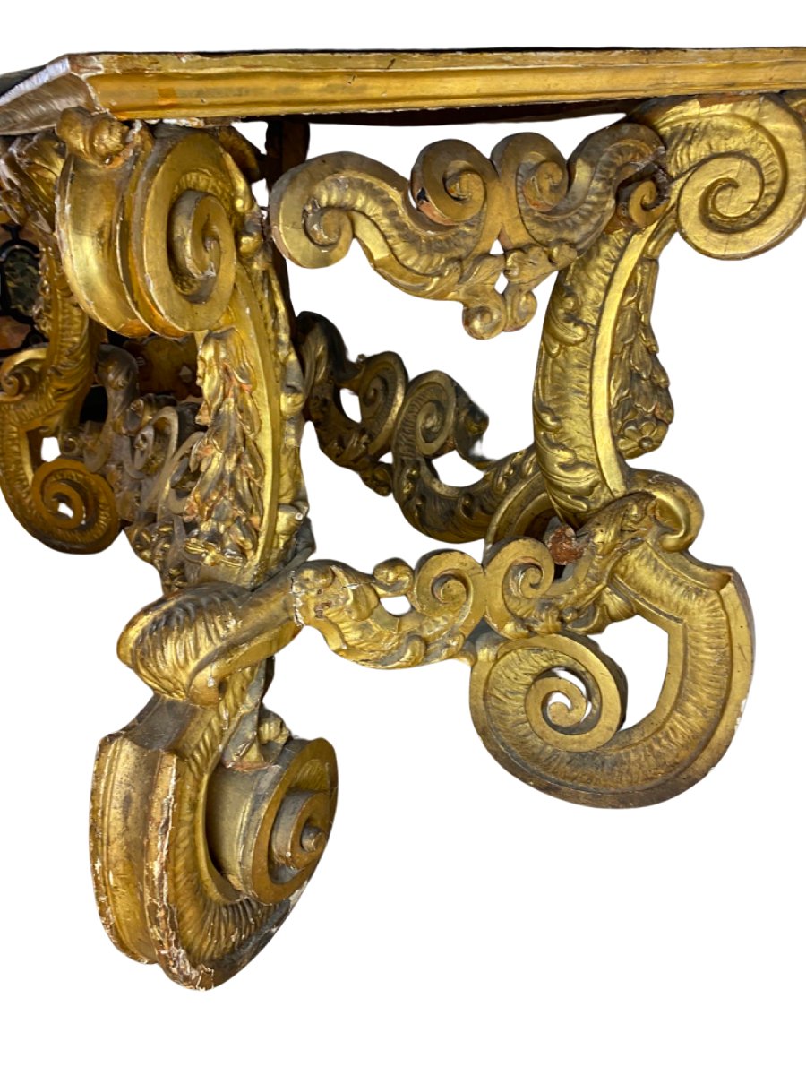 Italian Baroque Console Table In Gilded Wood With A Marble Top Set On A Stone Base.-photo-1