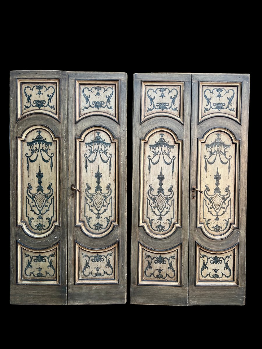 A Pair Of Doors That Are Painted And Decorated Also On The Back 